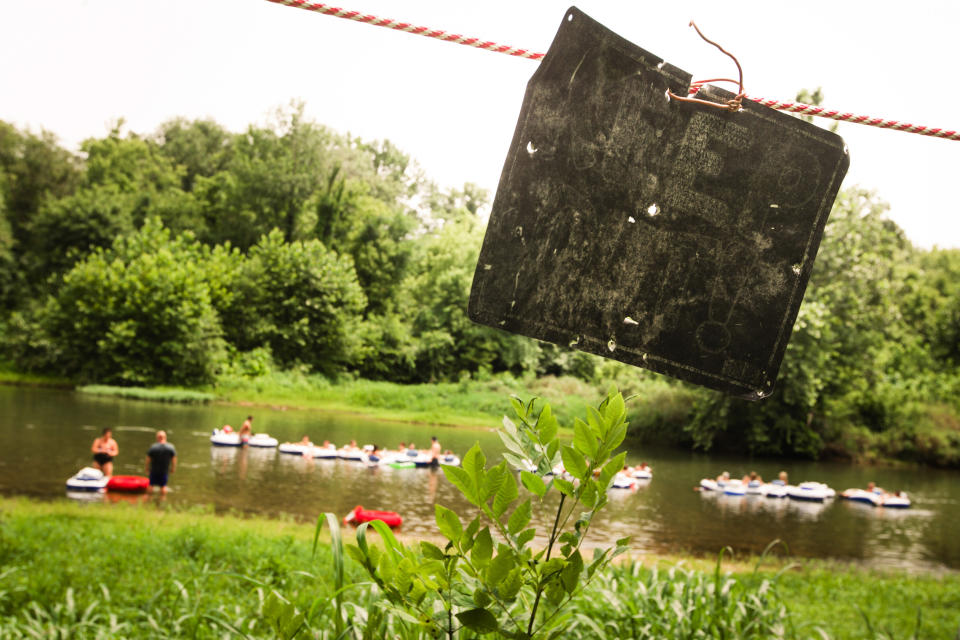 In this Aug. 3, 2013, photo a keep out sign warns passing floaters of private property along the Meramec River near Steelville, Mo. A murder case that will hinge on claims of self-defense and whether a property owner had the right to shoot a canoer who may have intruded on his land is the latest to put a spotlight on “castle doctrine” laws, which allow the use of deadly force to protect property. Missouri is among at least 30 states that have enacted the statues, which supporters say protect gun rights but others insist promote vigilantism. (AP Photo/The St. Louis Post-Dispatch, Erik M. Lunsford) EDWARDSVILLE INTELLIGENCER OUT; THE ALTON TELEGRAPH OUT