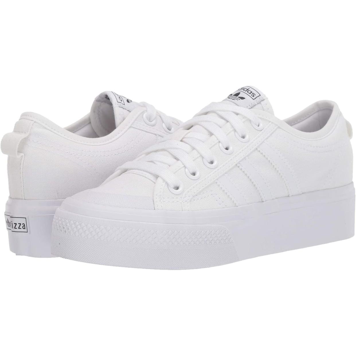 <p><a href="https://go.redirectingat.com?id=74968X1596630&url=https%3A%2F%2Fwww.zappos.com%2Fp%2Fadidas-originals-nizza-platform-wonder-white-white-ambient-sky%2Fproduct%2F9393541&sref=https%3A%2F%2Fwww.thepioneerwoman.com%2Ffashion-style%2Fg40515824%2Fbest-white-sneakers-for-women%2F" rel="nofollow noopener" target="_blank" data-ylk="slk:Shop Now;elm:context_link;itc:0;sec:content-canvas" class="link rapid-noclick-resp">Shop Now</a></p><p>Adidas Originals Nizza Platform</p><p>zappos.com</p><p>$75.00</p><span class="copyright">Zappos</span>