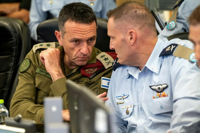 Israeli army chief General Herzi Halevi (L) warned Iran's attack at the weekend would be 'met with a response' (-)