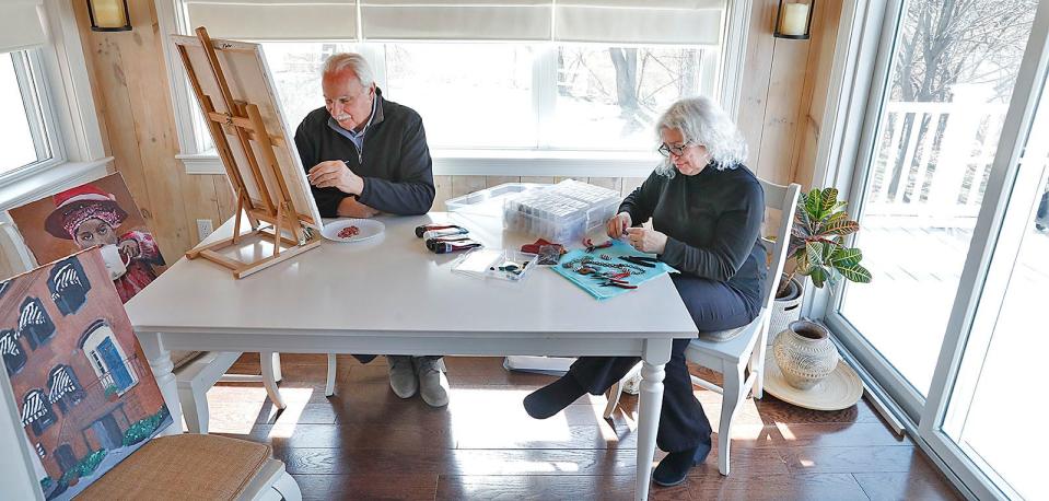 Frank and Linda Santoro, members of the Quincy Art Association, paint and make jewelry in their Beechwood Knoll home on Tuesday, April 5, 2022.
