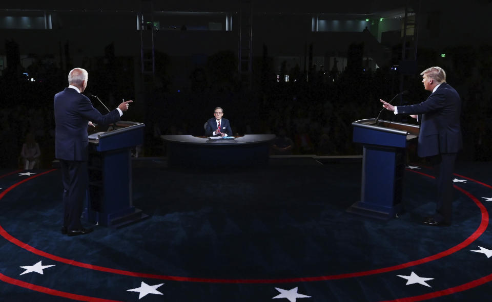 President Donald Trump and Democratic presidential candidate former Vice President Joe Biden participate in the first presidential debate Tuesday, Sept. 29, 2020, at Case Western University and Cleveland Clinic, in Cleveland. (Olivier Douliery/Pool via AP)