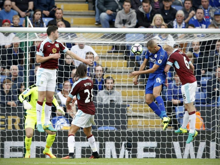 Leicester City's Islam Slimani (2nd R) scored two headed goals in a 3-0 win over Burnley on his league debut