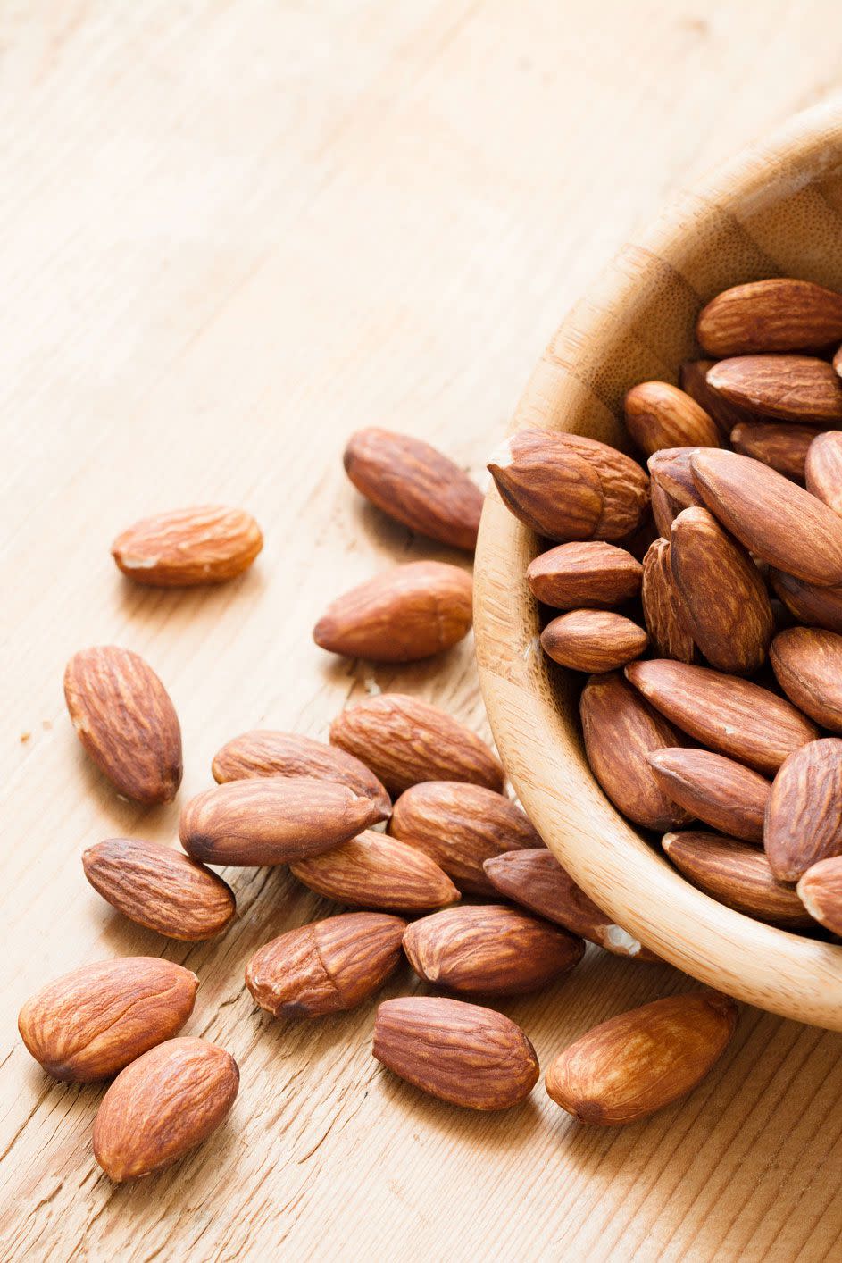 <p>As long as you don't go nuts on nuts (which can be calorie overload), they can be super beneficial in helping you <a rel="nofollow noopener" href="https://www.womansday.com/health-fitness/nutrition/g3141/what-to-eat-to-lose-weight/" target="_blank" data-ylk="slk:lose weight;elm:context_link;itc:0;sec:content-canvas" class="link ">lose weight</a>. In a study published in the <em><a rel="nofollow noopener" href="https://link.springer.com/article/10.1007%2Fs00394-017-1513-0" target="_blank" data-ylk="slk:European Journal of Nutrition;elm:context_link;itc:0;sec:content-canvas" class="link ">European Journal of Nutrition</a></em>, researchers found that those who got their protein from nuts instead of animal products had less weight gain than those who never ate them. So consider this your permission to snack on peanuts, almonds, hazelnuts, pistachios, and walnuts - so long as you practice portion control. If sodium is a concern, grab roasted or raw over salted varieties. </p>
