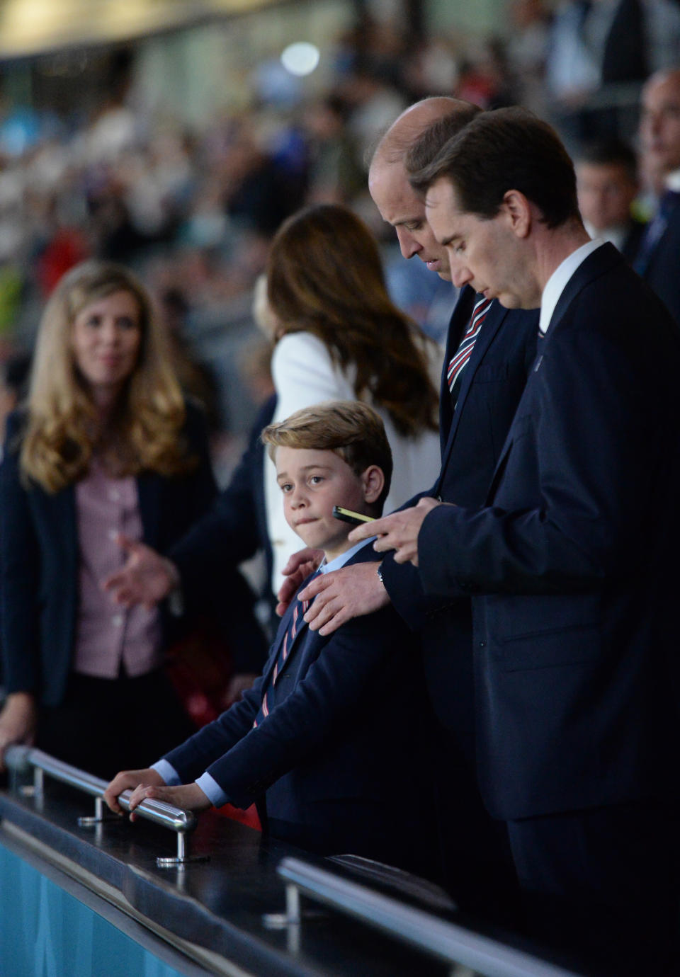 LONDON, ENGLAND - JULY 11: Prince George of Cambridge, Catherine, Duchess of Cambridge, and Prince William, Duke of Cambridge and President of the Football Association (FA) are seen in the stands prior to the UEFA Euro 2020 Championship Final between Italy and England at Wembley Stadium on July 11, 2021 in London, England. (Photo by Eamonn McCormack - UEFA/UEFA via Getty Images)