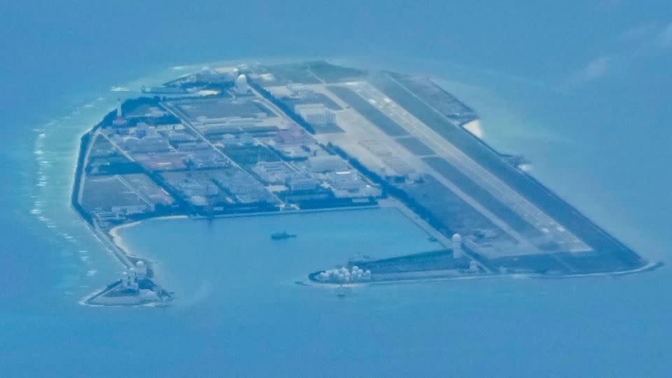 Chinese structures and buildings at the man-made island on Mischief Reef at the Spratlys group of islands in the South China Sea are seen on Sunday March 20, 2022.  - Aaron Favila/AP