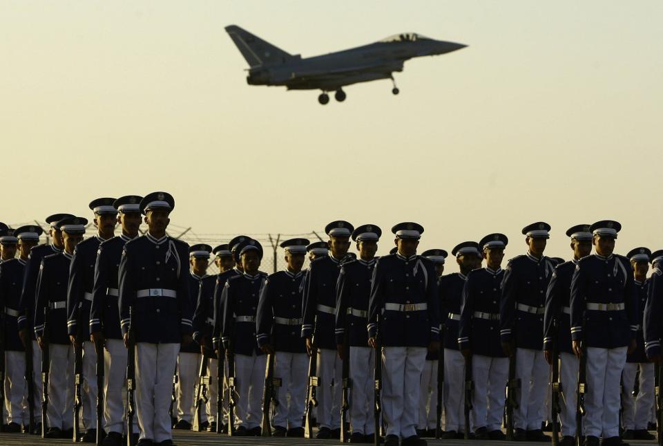 A Saudi air force jet flies in formation during a graduation ceremony for air force officers at King Faisal military college in Riyadh in December 2009.