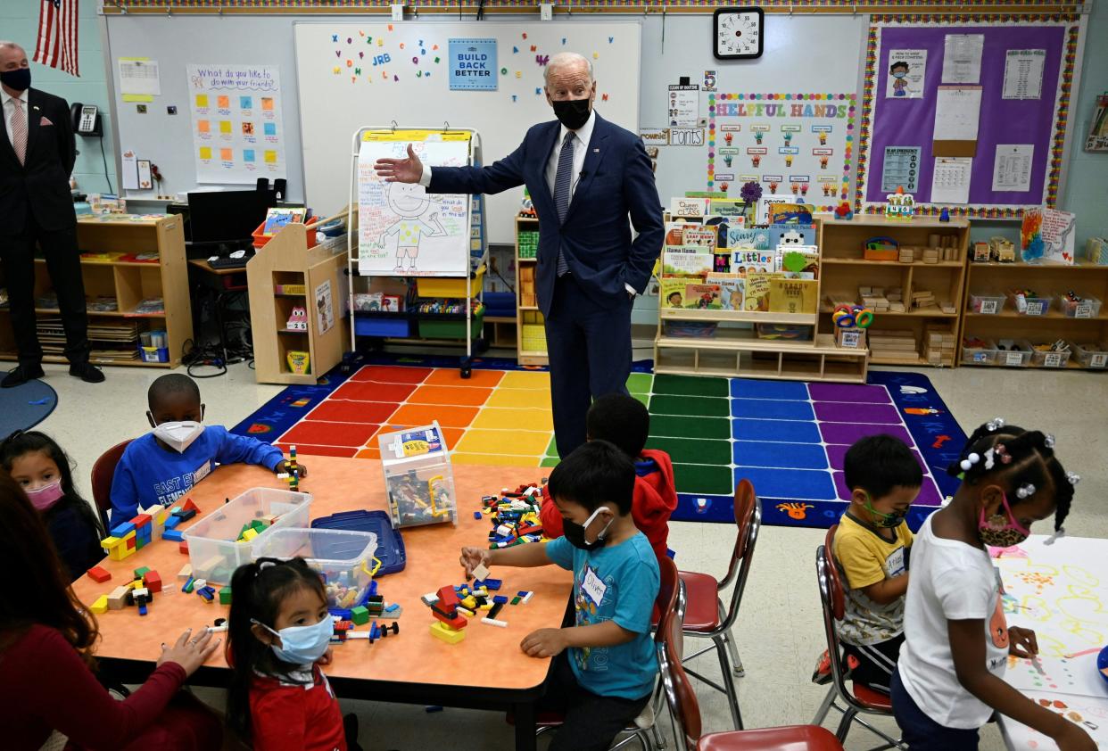 President Joe Biden talks to students during a visit to a pre-k classroom at East End elementary school in North Plainfield, N.J., to promote his Build Back Better agenda on Oct. 25, 2021.