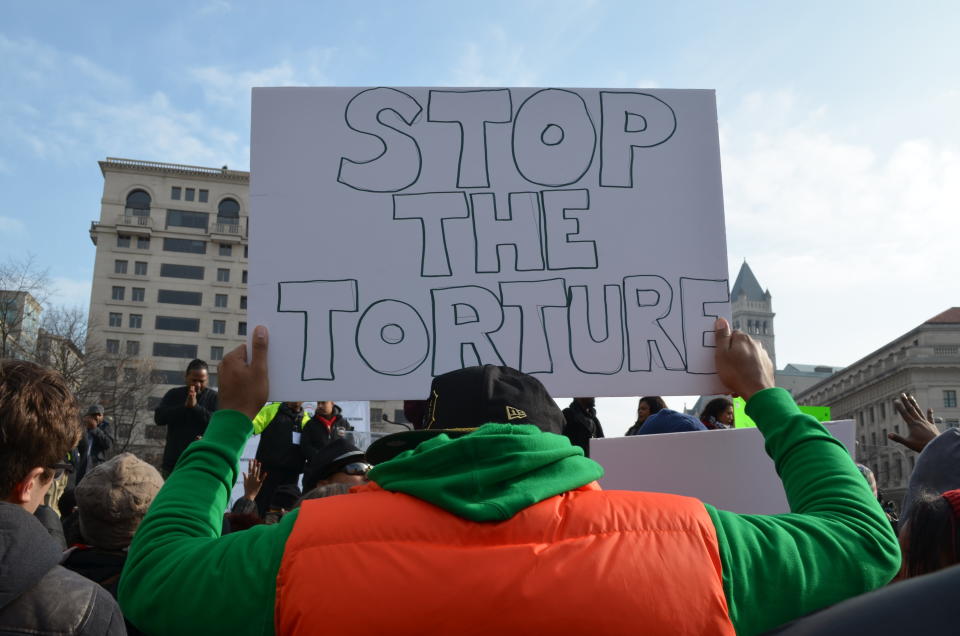 Protesters march towards the U.S. Capitol in Washington, DC on Saturday Dec. 13, 2014