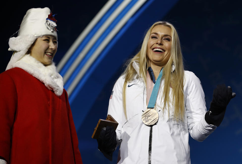 Lindsey Vonn celebrates her bronze medal for ladies’ downhill Alpine skiing at the 2018 Winter Olympics in PyeongChang, South Korea. (AP)