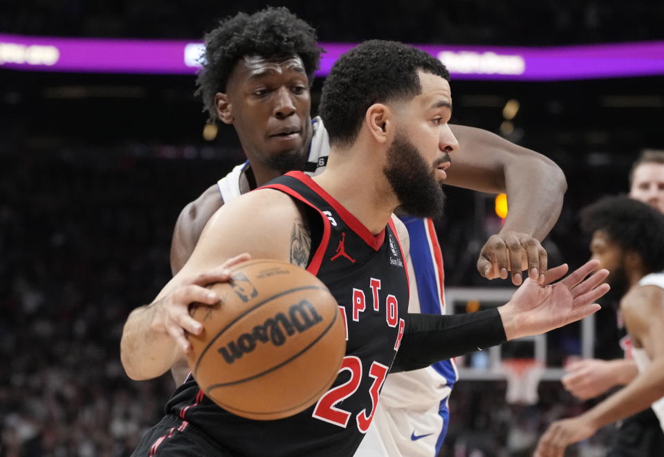 Toronto Raptors guard Fred VanVleet (23) drives past Detroit Pistons centre James Wiseman during the first half of an NBA basketball game Friday, March 24, 2023, in Toronto. (Frank Gunn/The Canadian Press via AP)