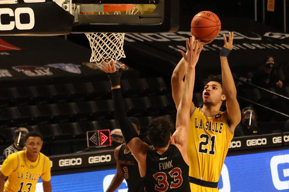 La Salle forward Clifton Moore gets off a shot during a game in March against Saint Joseph's. Moore will spend his final year of eligibility with the Friars.