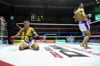 Muaythai boxers return to fight for the first time after temporary suspend due to the spread of the coronavirus disease (COVID-19) in Thailand