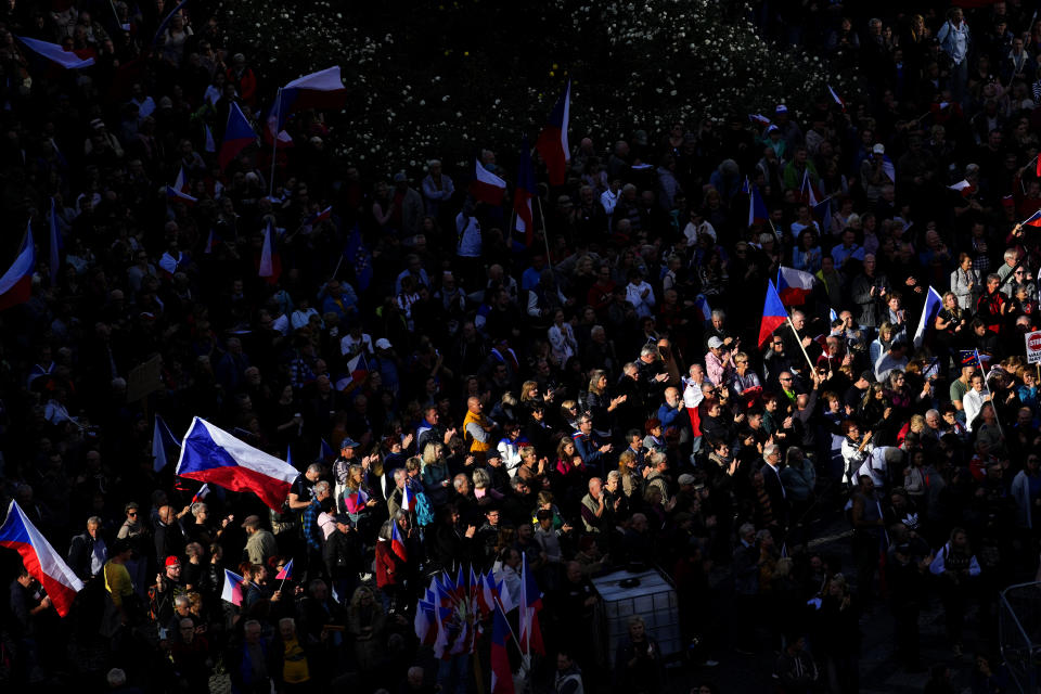 Several thousands of protesters from the far right and far left gathered to rally against the country's pro-Western Czech government at the Vencesla's Square in Prague, Czech Republic, Friday, Oct. 28, 2022. (AP Photo/Petr David Josek)