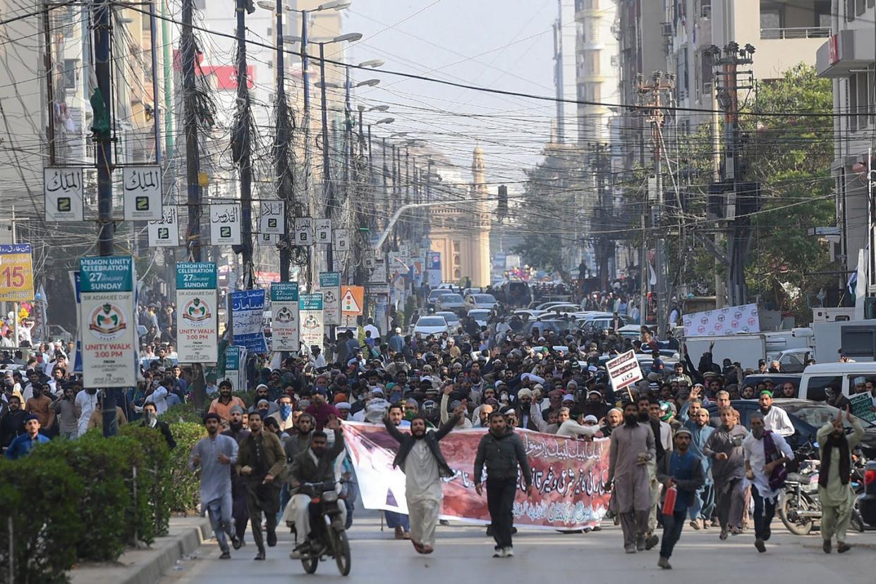 <span class="caption">Pakistani Islamists march to protest the Supreme Court lenient treatment of Asia Bibi, a Christian Pakistani woman accused of blasphemy, in Karachi, Feb. 1, 2019.</span> <span class="attribution"><a class="link " href="https://www.gettyimages.com/detail/news-photo/pakistani-islamists-march-to-protest-against-the-supreme-news-photo/1091981702?adppopup=true" rel="nofollow noopener" target="_blank" data-ylk="slk:ASIF HASSAN/AFP via Getty Images;elm:context_link;itc:0;sec:content-canvas">ASIF HASSAN/AFP via Getty Images</a></span>