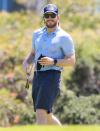 <p>Chris Pratt smiles wide on Monday during a game of golf in Sydney, Australia.</p>