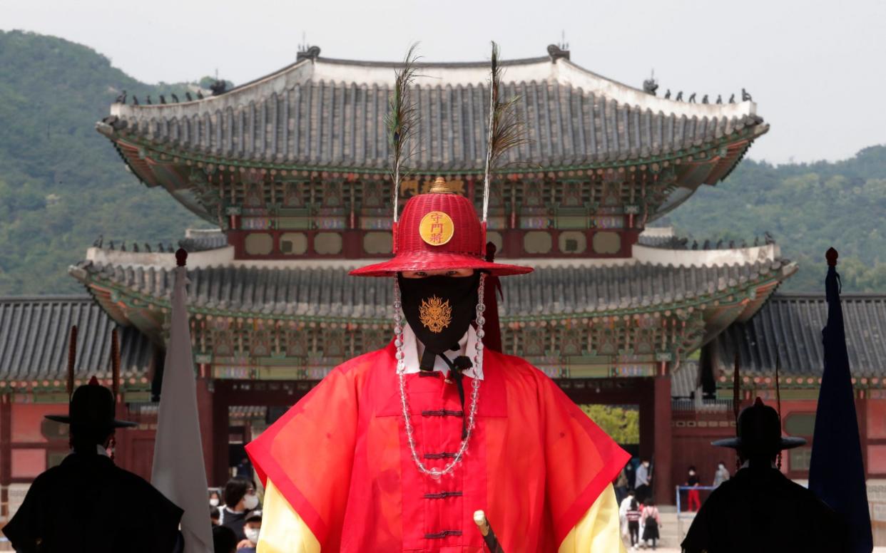 South Korea has expressed gratitude to foreign war veterans by sending masks - Ahn Young-joon/AP