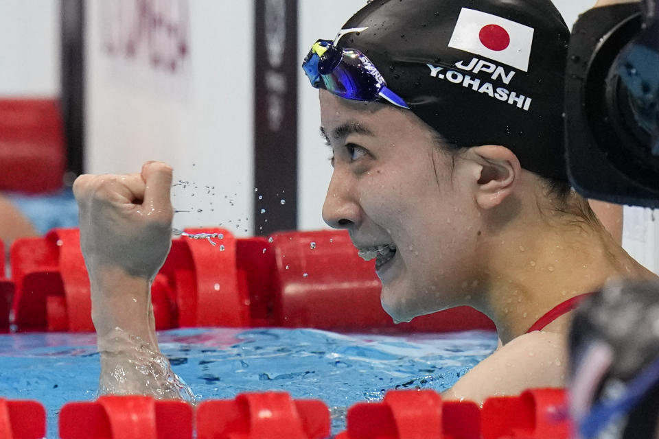 Yui Ohashi, of Japan, celebrates after winning the women's 200-meter individual medley final at the 2020 Summer Olympics, Wednesday, July 28, 2021, in Tokyo, Japan. (AP Photo/Petr David Josek)