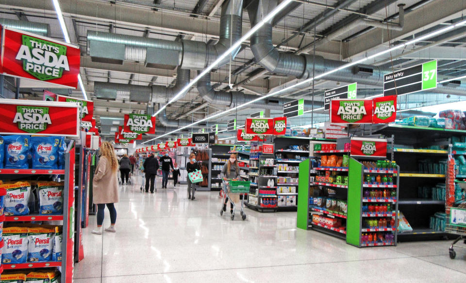 LONDON, UNITED KINGDOM - 2020/10/03: Asda's famous slogan 'thats Asda Price' seen displayed all over the inside of a store. UK's third biggest supermarket chain Asda has been sold by its US owner Walmart.Billionaire brothers Mohsin & Zuber Issa and private equity firm TDR Capital won the bidding war in a £6.8billion deal. The Blackburn based Issa brothers own EG Group, which they built from a single petrol station in 2001 to more than 6,000 sites around the globe and an annual turnover of £20billion. It will be the first time Asda has been in British ownership for over 20 years. (Photo by Keith Mayhew/SOPA Images/LightRocket via Getty Images)