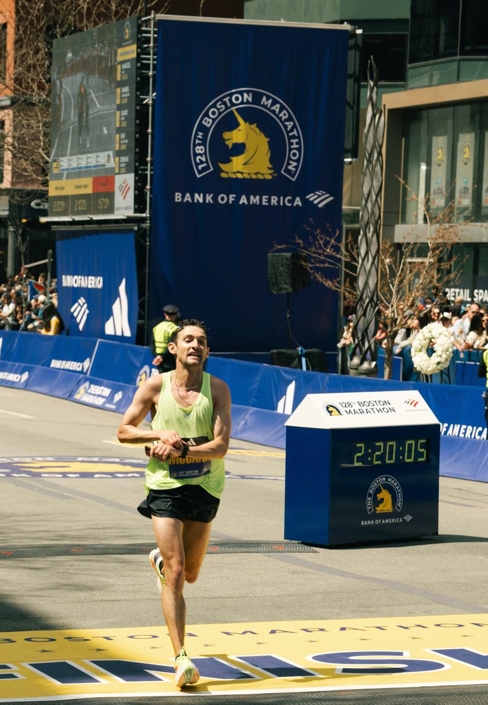 Andrew McCann of Misquamicut finishing the Boston Marathon on Monday.