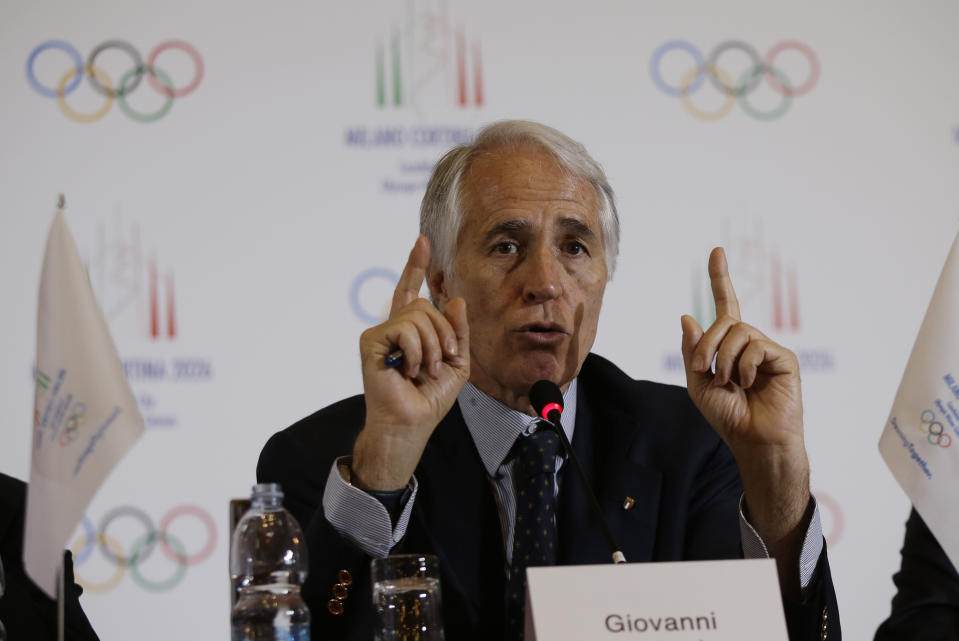 FILE - In this April 6, 2019 file photo, President of the Italian National Olympic Committee, CONI, Giovanni Malago' gestures as he talks during a winter Olympics Milan Cortina bid IOC Evaluation Commission final news conference, in Milan, Italy. The International Olympic Committee is slated in January 2021 to consider imposing a humiliating probation on Italy’s team for the Tokyo Games due to a two-year domestic dispute that it says amounts to government interference. (AP Photo/Luca Bruno, file)