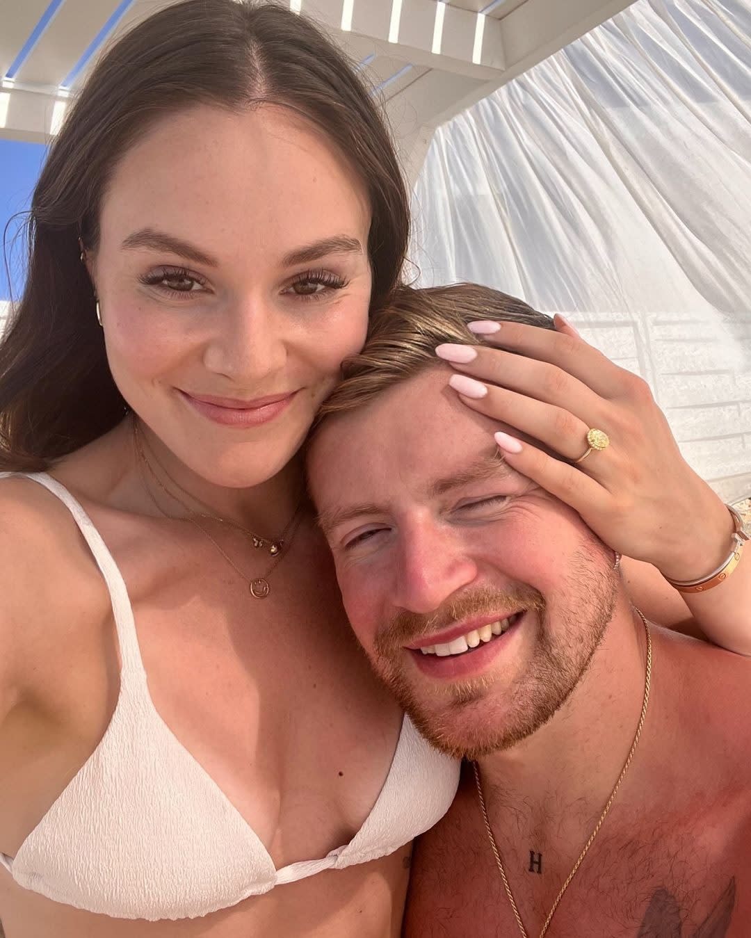 Ms Ramsay shared a picture on Instagram of her with Peaty and wearing the engagement ring