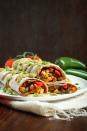 <p>No kid has ever been bummed about having breakfast for lunch. Make these tasty burritos that are so filling, your child probably won't even finish it (we'll take that as a win!).<br></p><p><strong><a rel="nofollow noopener" href="http://thevegan8.com/2015/09/28/easy-vegan-mexican-breakfast-burritos/" target="_blank" data-ylk="slk:Get the recipe at The Vegan 8.;elm:context_link;itc:0;sec:content-canvas" class="link ">Get the recipe at The Vegan 8.</a></strong></p>