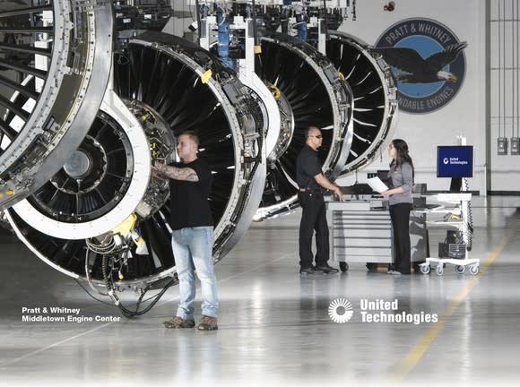 Workers on the line at a Pratt & Whitney engine center.