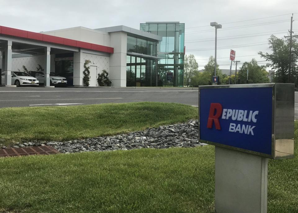 Customers use drive-through lanes at a Republic Bank office in Cherry Hill.