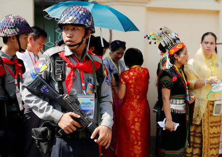 Police stand guard outside the residence of Cardinal Charles Maung Bo, Archbishop of Yangon, where Pope Francis will be staying during his visit in Yangon, Myanmar November 27, 2017. REUTERS/Jorge Silva