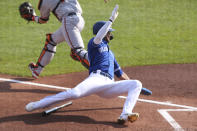 Toronto Blue Jays Lourdes Gurriel Jr. scores on a sacrifice fly by Jonathan Davis during the second inning of a baseball game against the Baltimore Orioles, Sunday, Sept. 27, 2020, in Buffalo, N.Y. (AP Photo/Jeffrey T. Barnes)
