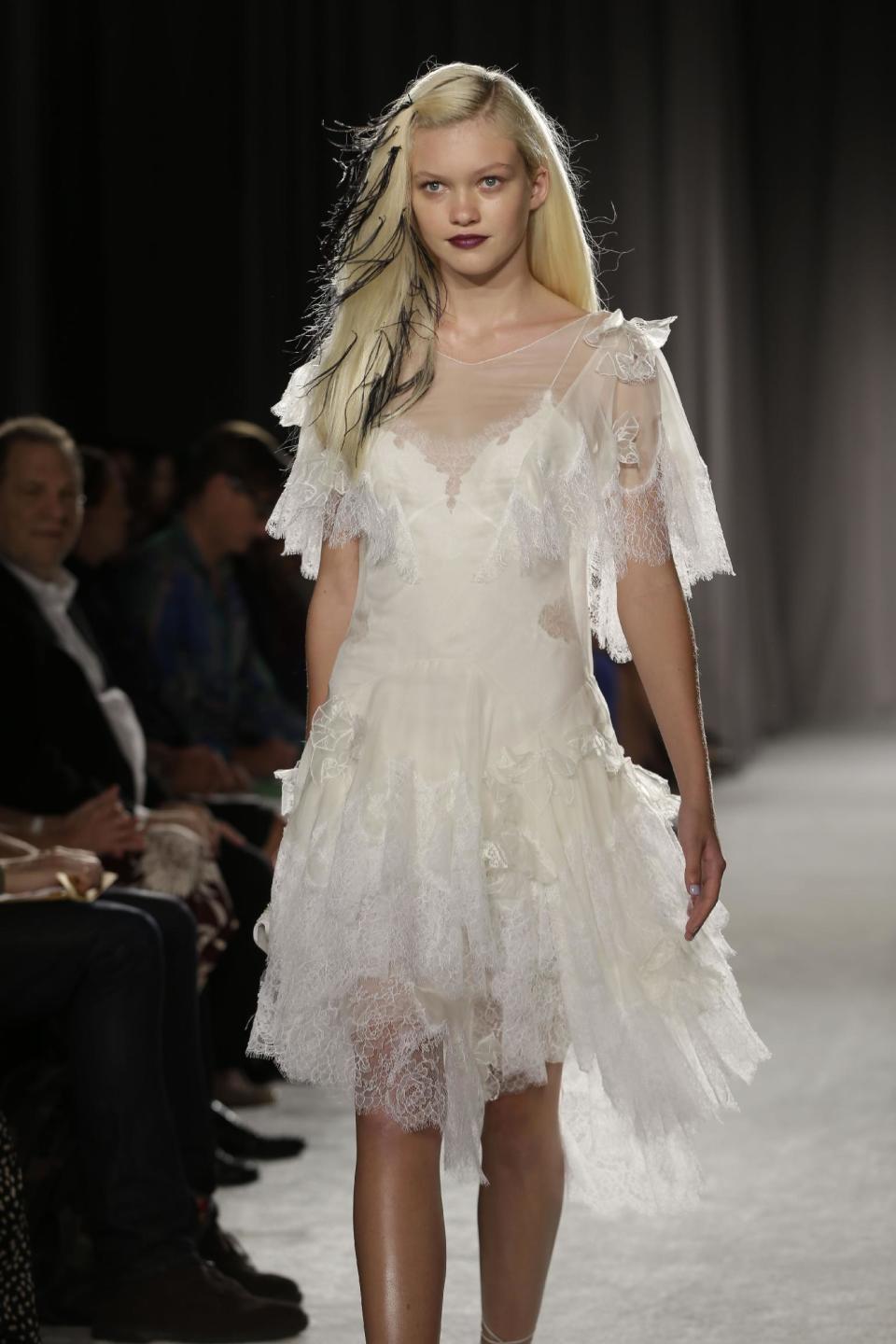 The Marchesa Spring 2014 collection is modeled during Fashion Week in New York, Wednesday, Sept. 11, 2013. (AP Photo/Seth Wenig)