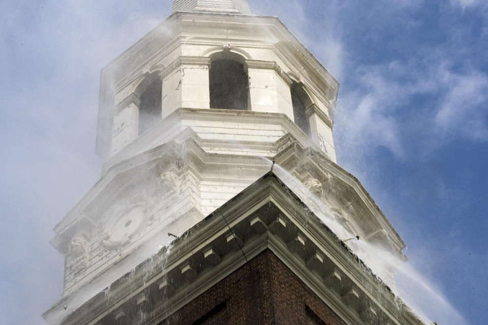 The historic Christ Church test its fire suppression system ahead of summer renovations in Philadelphia, Wednesday, April 17, 2019. (AP Photo/Matt Rourke)