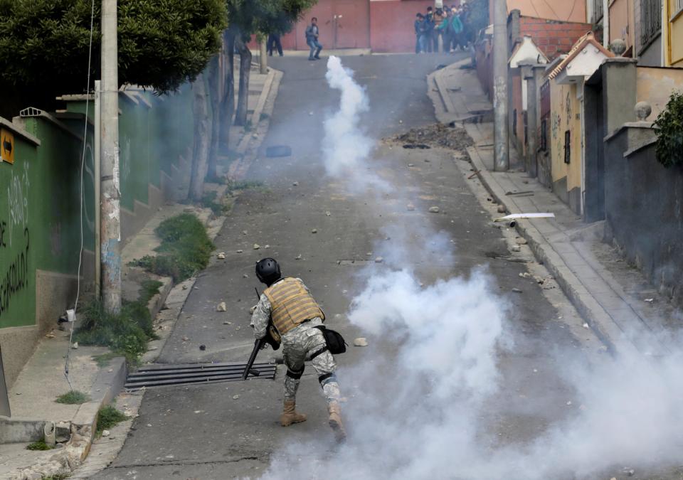 Bolivia riot police farmers protest coca cocaine tear gas