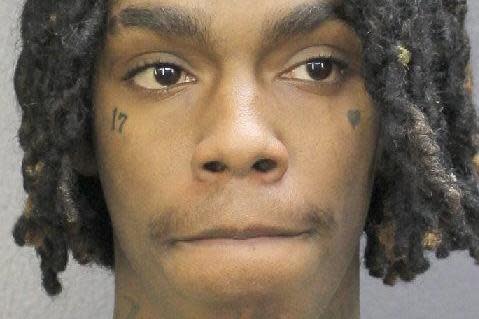 YNW Melly is seen in a police booking photo after being charged with two counts of murder in the first degree on 13 February, 2019 in Ft Lauderdale, Florida: (Photo by Broward's Sheriff's Office via Getty Images)