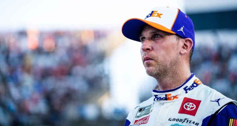 Denny Hamlin looks on after exiting his No. 11 Toyota at Martinsville Speedway