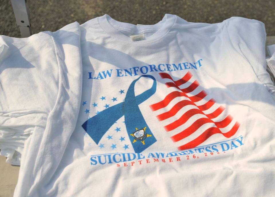 T-Shirts promoting Law Enforcement Suicide Awareness Day were available during the Law enforcement Suicide Awareness Walk in Braintree, Saturday, Aug. 28, 2021.