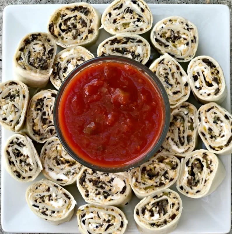 <p>Krista Marshall</p><p>Perfect for a party, packed lunch or game day snack.</p><p><strong>Get the recipe: <a href="https://parade.com/842440/kristamarshall/game-day-green-chile-pinwheels/" rel="nofollow noopener" target="_blank" data-ylk="slk:Green Chile Pinwheels;elm:context_link;itc:0;sec:content-canvas" class="link ">Green Chile Pinwheels</a></strong></p>