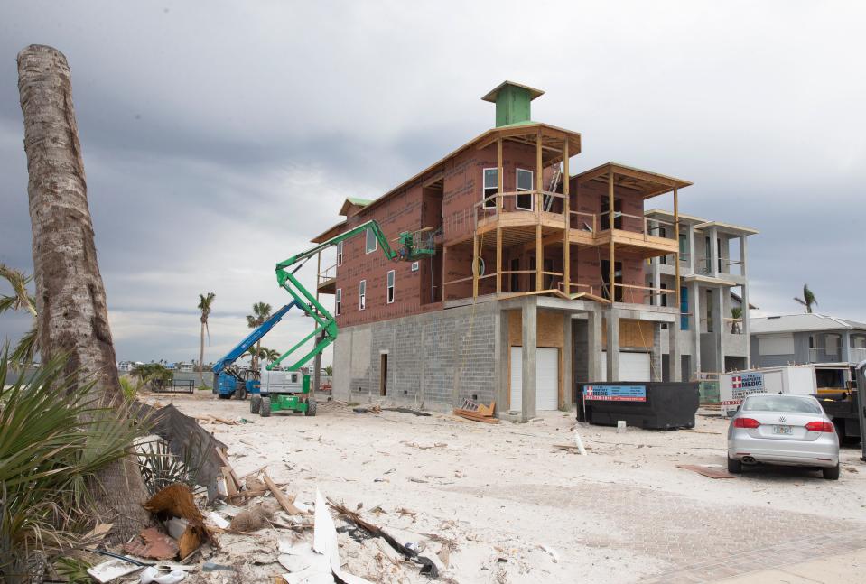 Houses on Fort Myers Beach on Wednesday, March 15, 2023. Almost every structure on the beach was impacted by the Hurricane Ian on Sept. 28, 2022.  