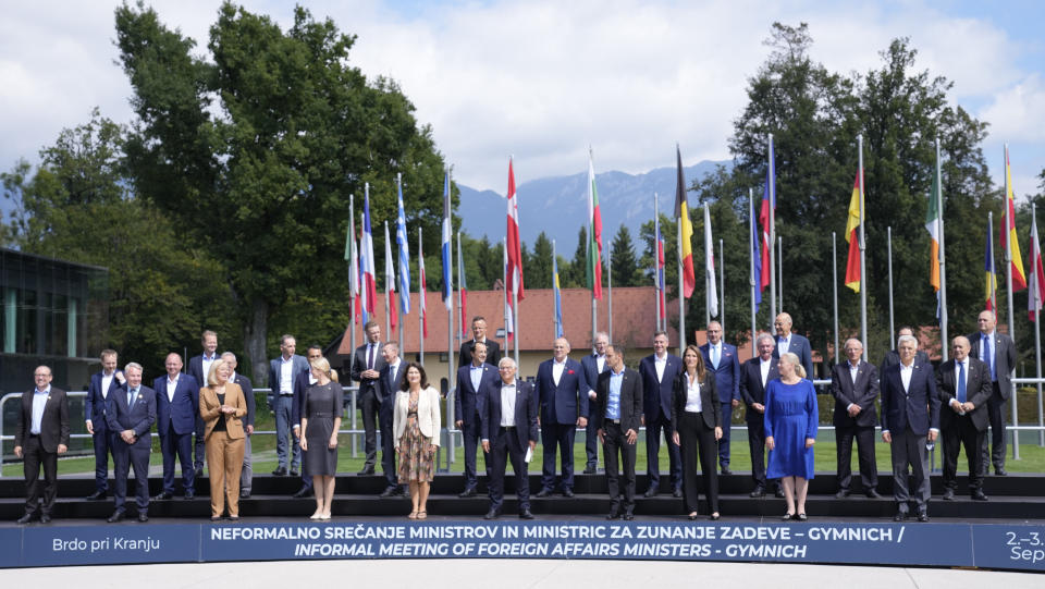 European Union foreign ministers pose for a group photo during a meeting of EU foreign ministers at the Brdo Congress Center in Kranj, Slovenia, Friday, Sept. 3, 2021. European Union officials listed Friday a set of conditions to the Taliban including the respect of human rights and rule of law that should define the level of engagement the 27-nation bloc will develop with the new Afghanistan rulers. (AP Photo/Darko Bandic)
