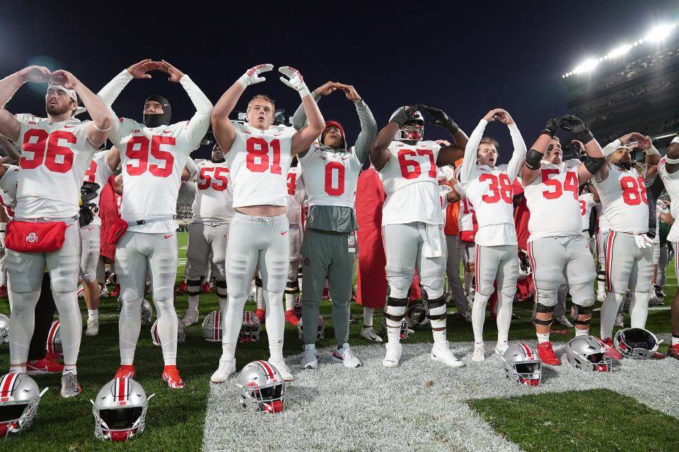 Oct 8, 2022; East Lansing, Michigan, USA; Ohio State Buckeyes sing Carmen Ohio after their NCAA Division I football game between the Ohio State Buckeyes and Michigan State Spartans at Spartan Stadium. 