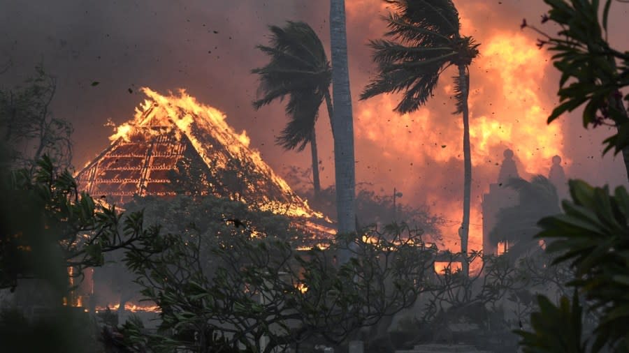 The hall of historic Waiola Church in Lahaina and nearby Lahaina Hongwanji Mission are engulfed in flames along Wainee Street on Tuesday in Lahaina, Hawaii. (Photo: Matthew Thayer/The Maui News via AP)