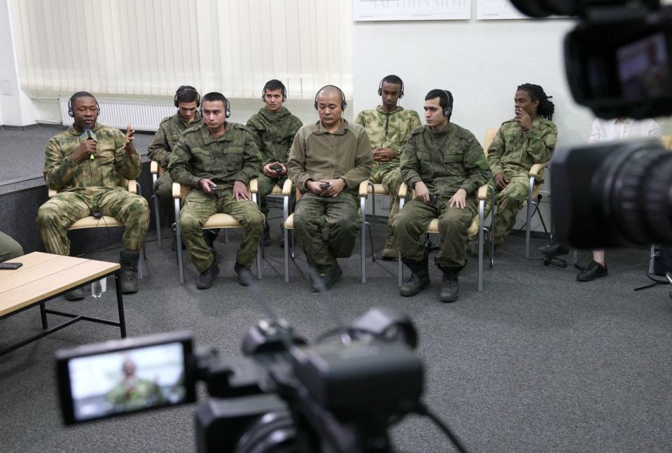 Foreign soldiers made prisoners of war (POW) after being captured by Ukraine as combatants within the Russian armed forces take part in a press conference organized by Ukrainian officials in Kyiv, Ukraine, on March 15, 2024, amid the Russian invasion of Ukraine. Speaking at a press conference organized by Ukrainian officials, eight POWs from Cuba, Nepal, Sierra Leone and Somalia said they were lured with promises of high wages, non-frontline roles or simply tricked. Organizers defined the men as "mercenaries" from the "Global South" and said they were treating them the same as Russian POWs. (Anatolii Stepanov/AFP via Getty Images)