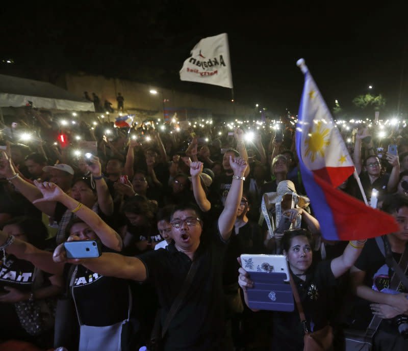 Filipinos celebrate the anniversary of the EDSA People Power Revolution at the People Power Monument in Quezon City, Manila, February 25, 2017. File photo by Rolex Dela Pena/EPA