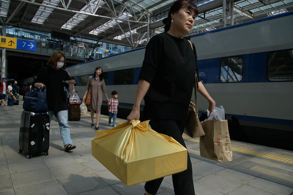 秋夕（Photo by Ed JONES / AFP, Image Source : Getty Editorial） Images)