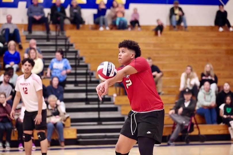 Ripon's Marquell Marshall intercepts the ball during one of the Indian's boys volleyball games during the 2023-24 season.