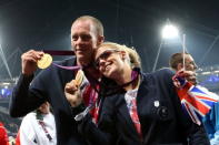 LONDON, ENGLAND - SEPTEMBER 09: Gold medallist rowers David Smith and Naomi Riches of Great Britain enjoy the atmosphere during the closing ceremony on day 11 of the London 2012 Paralympic Games at Olympic Stadium on September 9, 2012 in London, England. (Photo by Peter Macdiarmid/Getty Images)