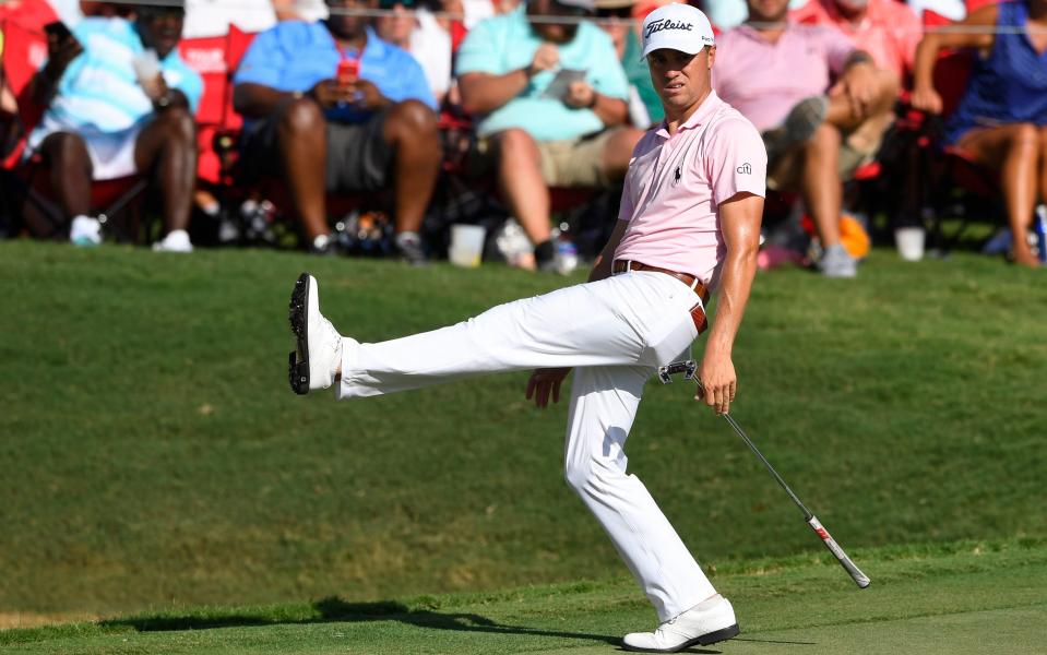 Justin Thomas appears to execute an impromptu re-enactment of the The Ministry of Silly Walks sketch from the Monty Python's Flying Circus – it is, after all, the silly season in golf - Copyright 2019 The Associated Press. All rights reserved
