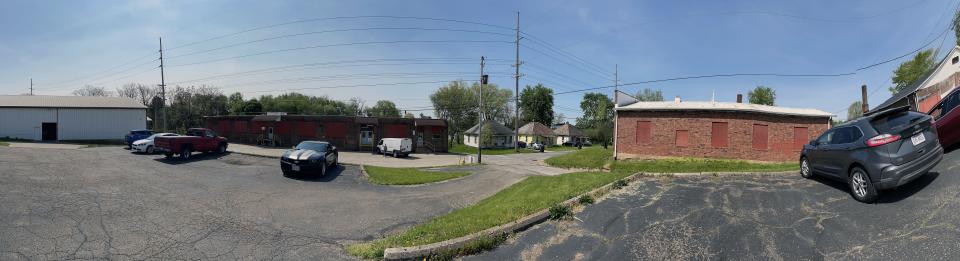 A photo of the three buildings the new owners of Friendly Wholesale use for overflow inventory and call the OB (Other Building), State Building and Vending Building. There also is a fourth building the owners call the Main Building.