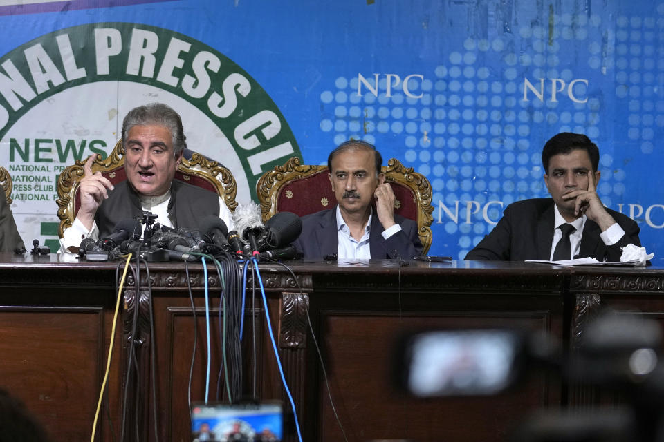 Shah Mahmood Qureshi, left, a top leader of Pakistan's former Prime Minister Imran Khan's 'Pakistan Tehreek-e-Insaf' party with Khan's legal team Shoaib Shaheen, center, and Naeem Haider Panjutha gives a press conference regarding Khan's arrest and his cases in Islamabad, Pakistan, Monday, Aug. 7, 2023. Khan is now an inmate at a high-security prison after being convicted of corruption and sentenced to three years. (AP Photo/Anjum Naveed)