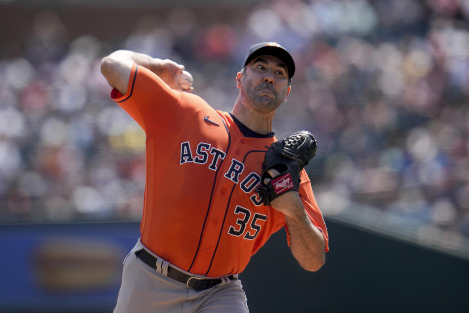 Houston Astros pitcher Justin Verlander throws against the Detroit Tigers in the first inning of a baseball game, Sunday, Aug. 27, 2023, in Detroit. (AP Photo/Paul Sancya)